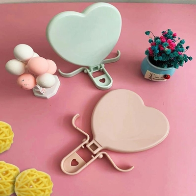 Lady Dressing Herzförmige Tasche Verstellbares Make-up Kompaktes Mini-Spiegel mit Qualit